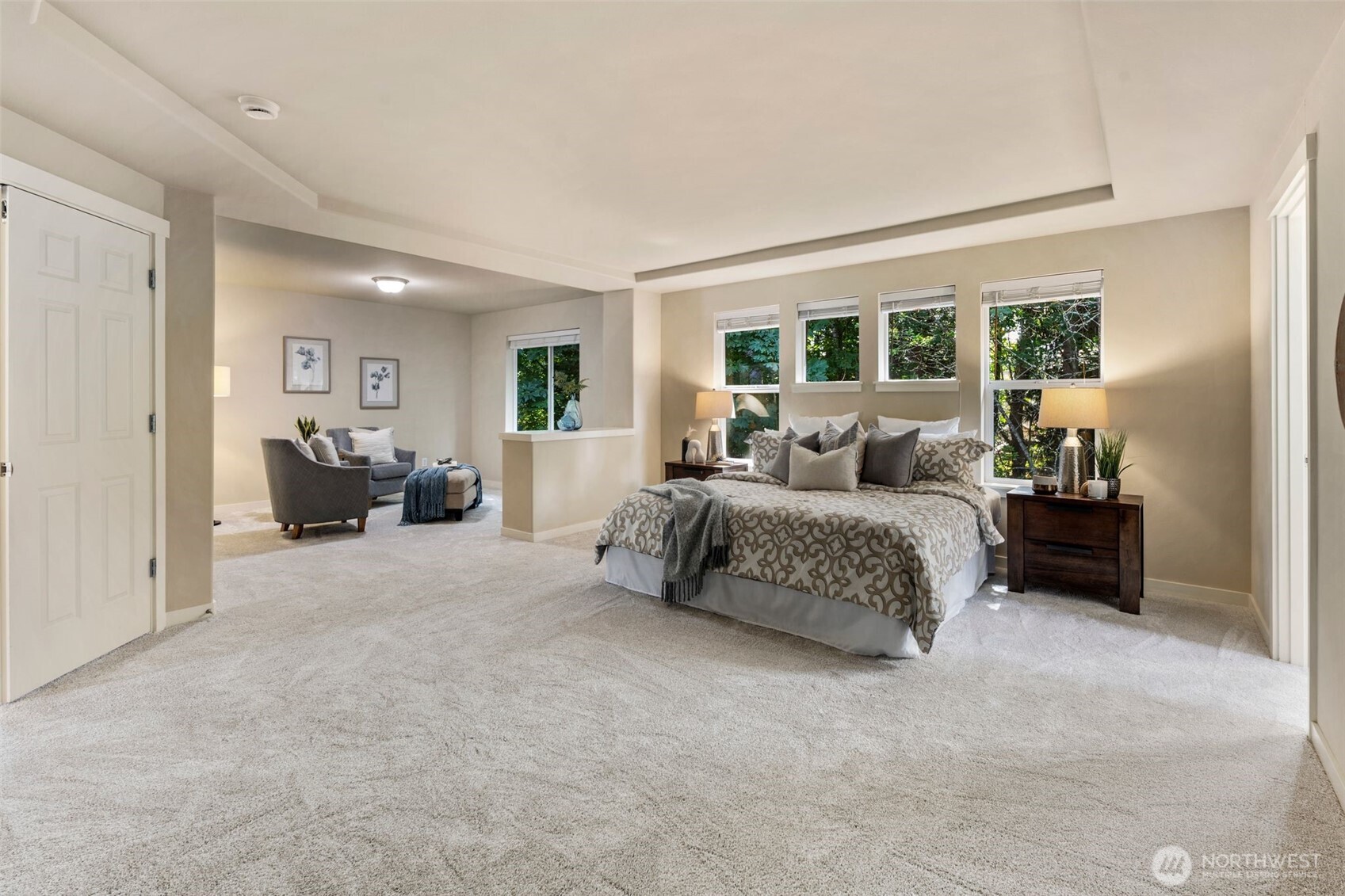 21705 38th Drive Southeast Bothell, WA 98021 - Photo 17 of 40 a bedroom with a bed and glass window