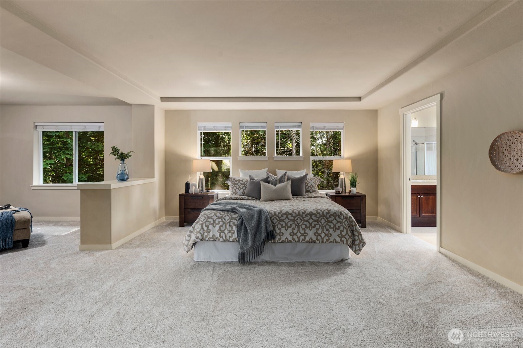 21705 38th Drive Southeast Bothell, WA 98021 - Photo 19 of 40 a spacious bedroom with a large bed and a couch