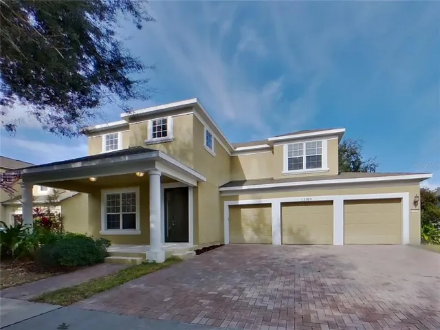 front view of a house with a yard