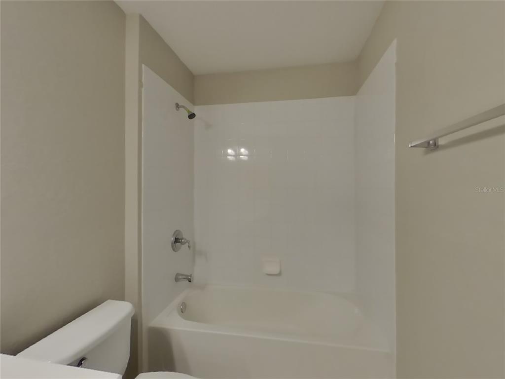 Undisclosed Address Windermere, FL 34786 - Photo 14 of 19 a bathroom with a bathtub