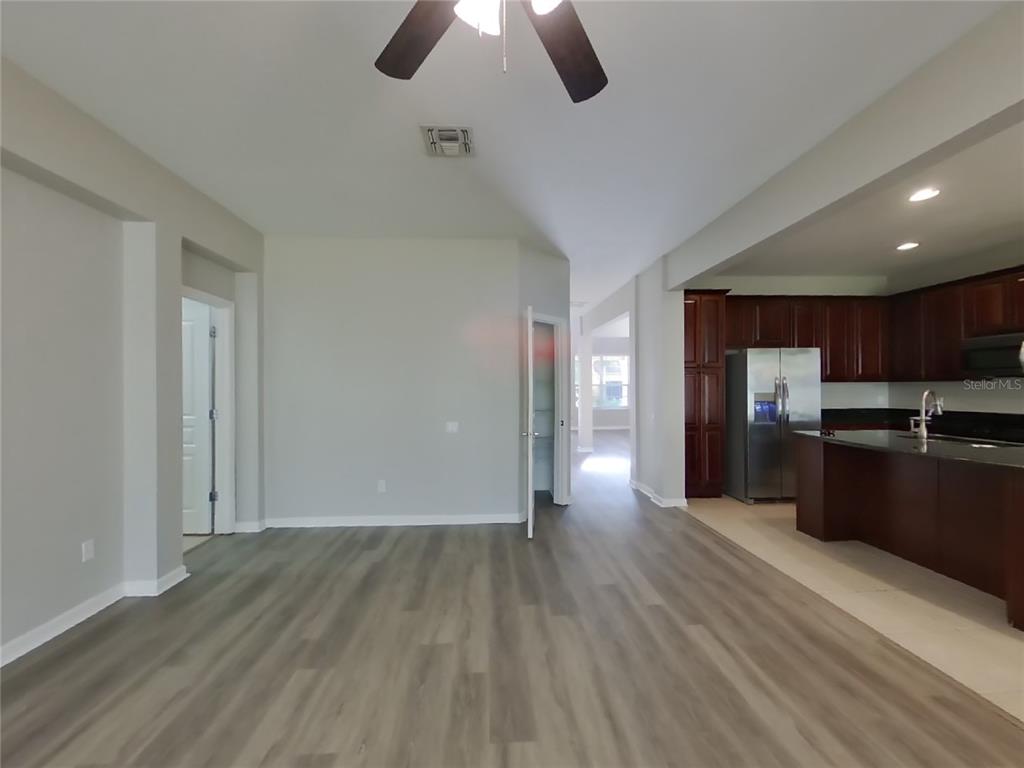 Undisclosed Address Windermere, FL 34786 - Photo 3 of 19 a view of kitchen with sink microwave and refrigerator