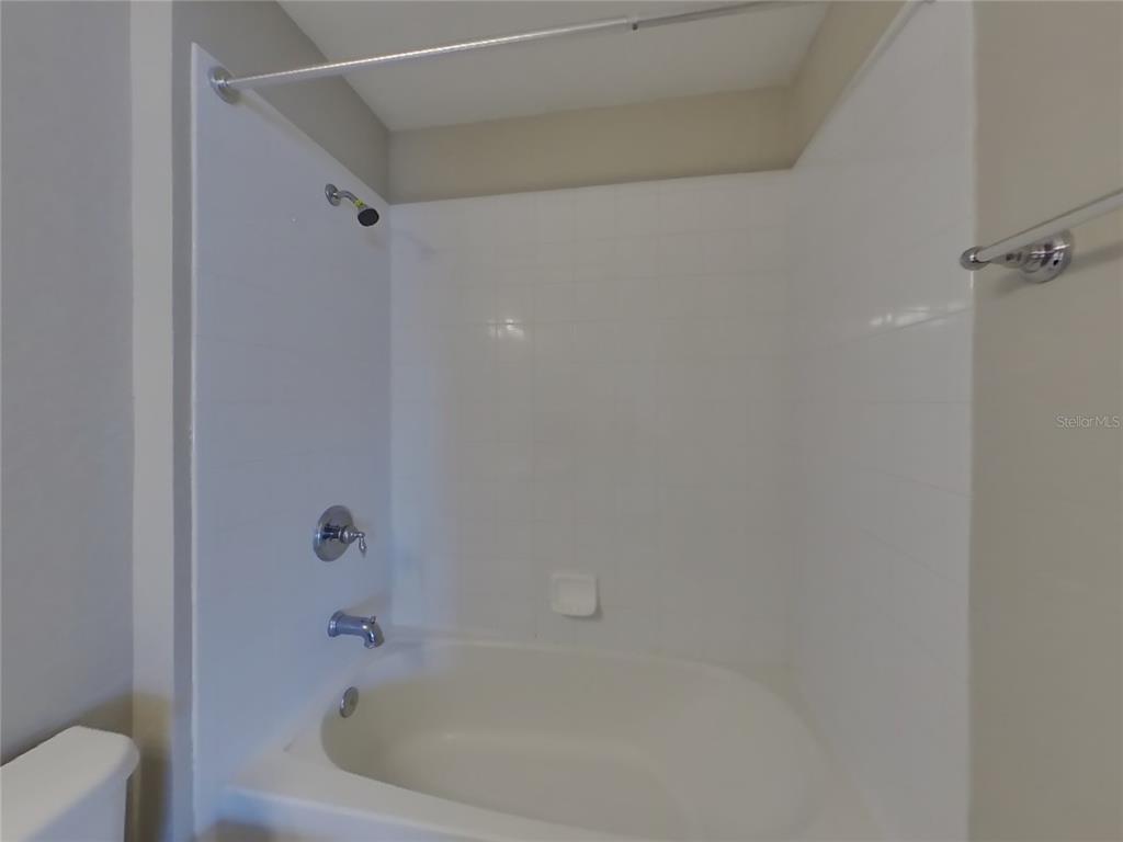 Undisclosed Address Windermere, FL 34786 - Photo 10 of 19 a bathroom with a bathtub