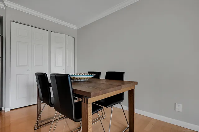 a kitchen with living room and furniture