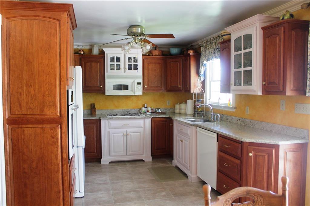 630 Chicora Road Butler, PA 16002 - Photo 5 of 24 Two-tone Kitchen with granite counter tops.