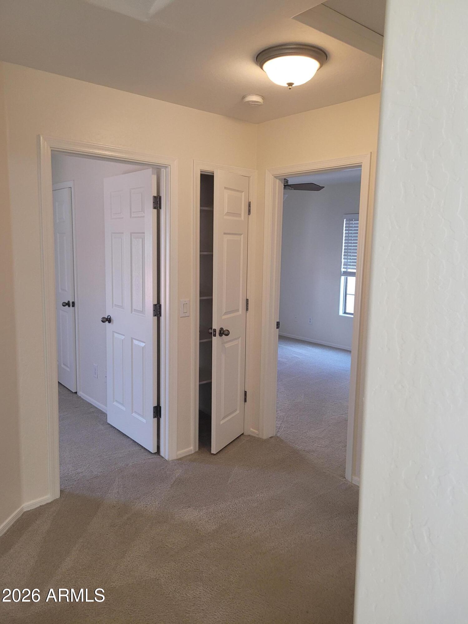 1453 South Sinova Avenue Gilbert, AZ 85296 - Photo 35 of 46 a view of a hallway