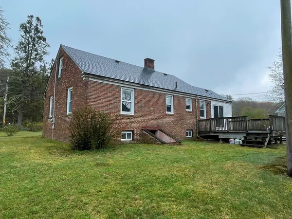 a view of a yard in front of a house