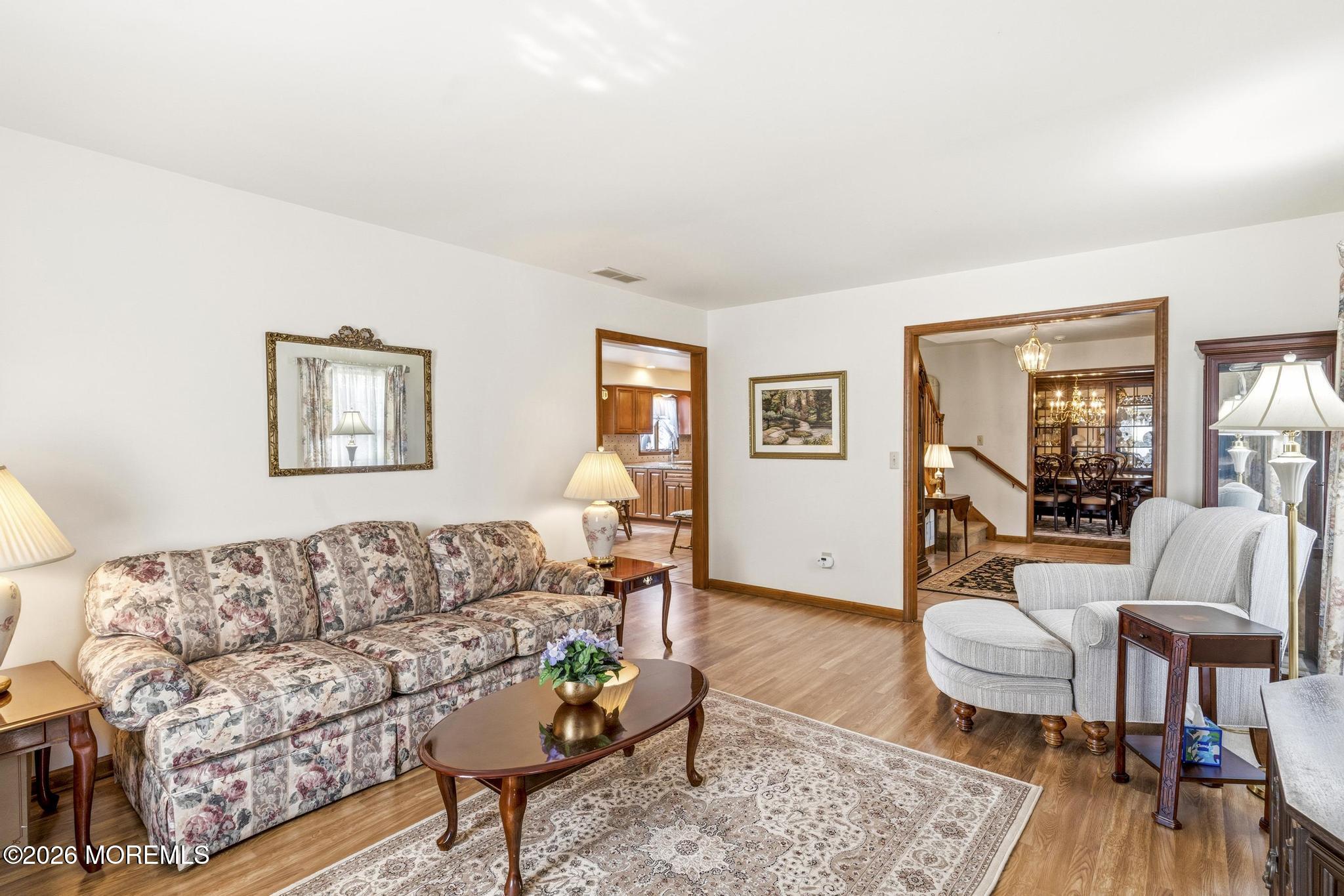 100 Sheldon Avenue Neptune Township, NJ 07753 - Photo 14 of 75 a living room with furniture and a wooden floor