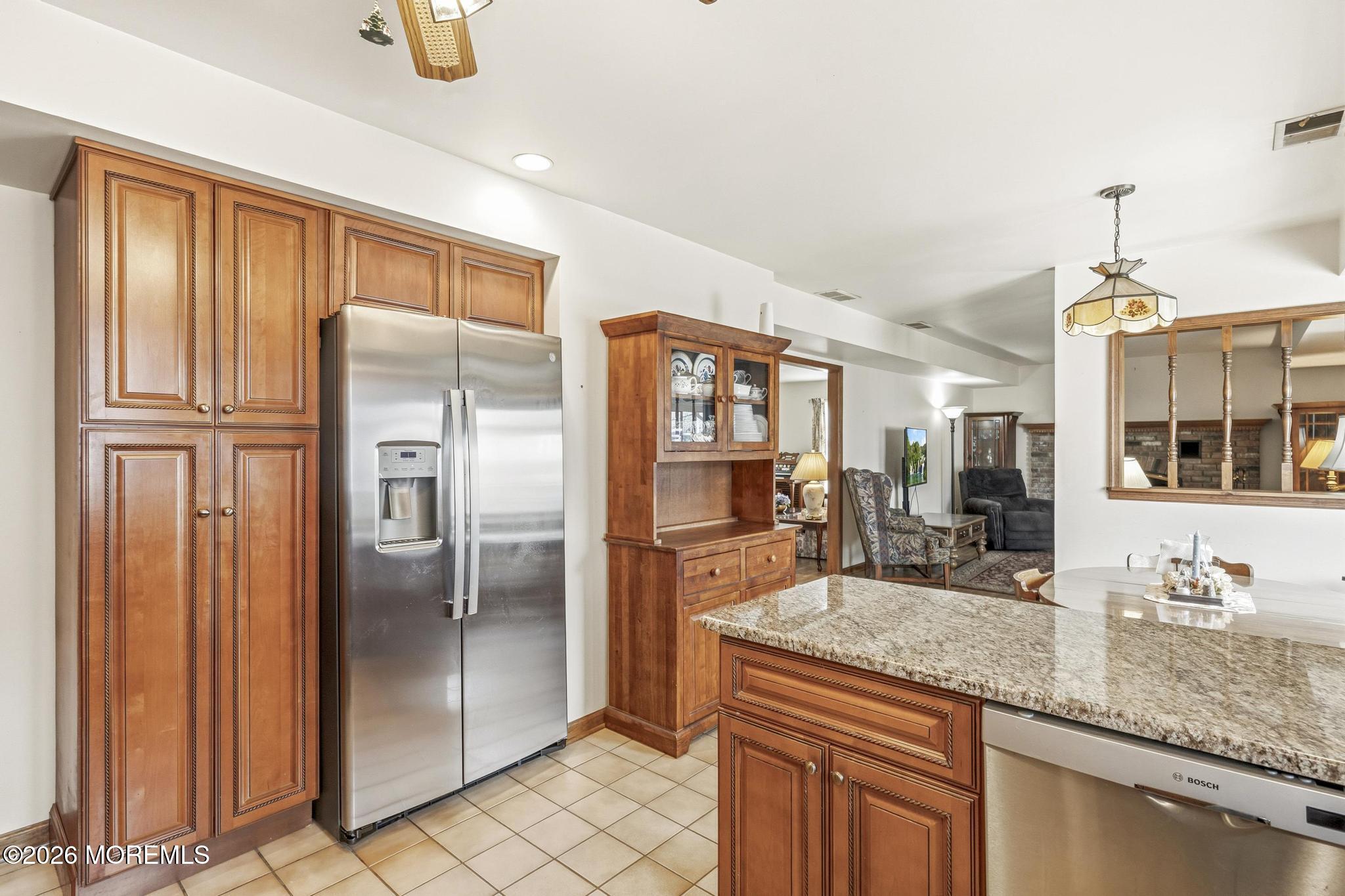 100 Sheldon Avenue Neptune Township, NJ 07753 - Photo 22 of 75 a kitchen with stainless steel appliances granite countertop a refrigerator and a sink