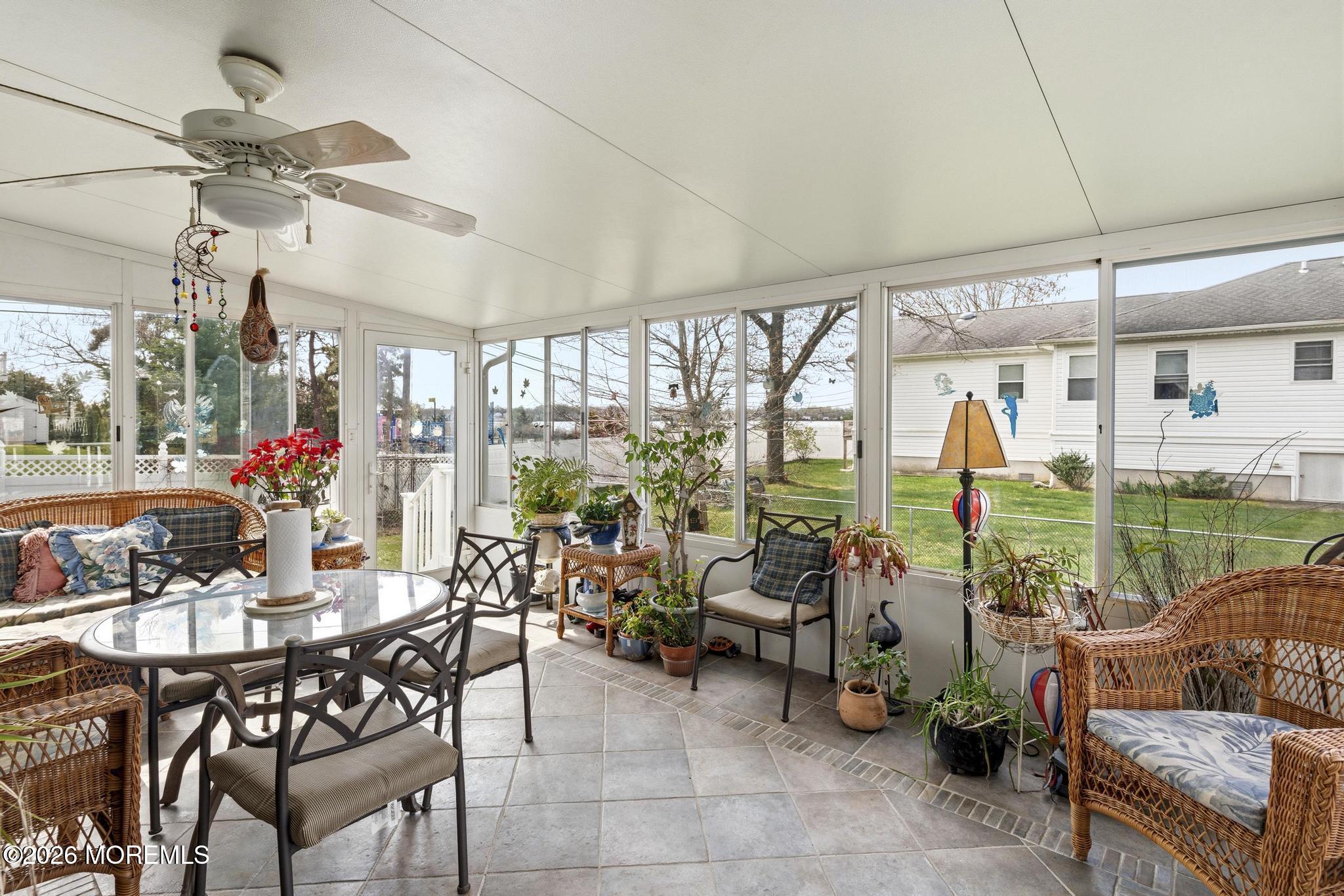 100 Sheldon Avenue Neptune Township, NJ 07753 - Photo 30 of 75 a view of a dining room with furniture water view and garden view