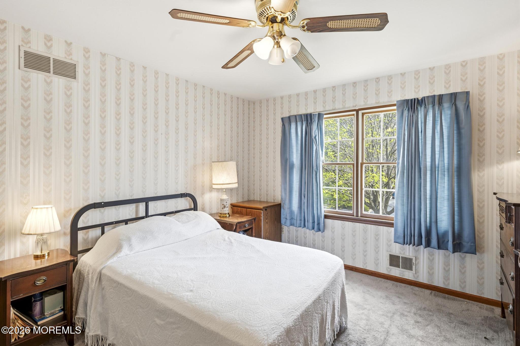 100 Sheldon Avenue Neptune Township, NJ 07753 - Photo 38 of 75 a bedroom with a large bed and a window