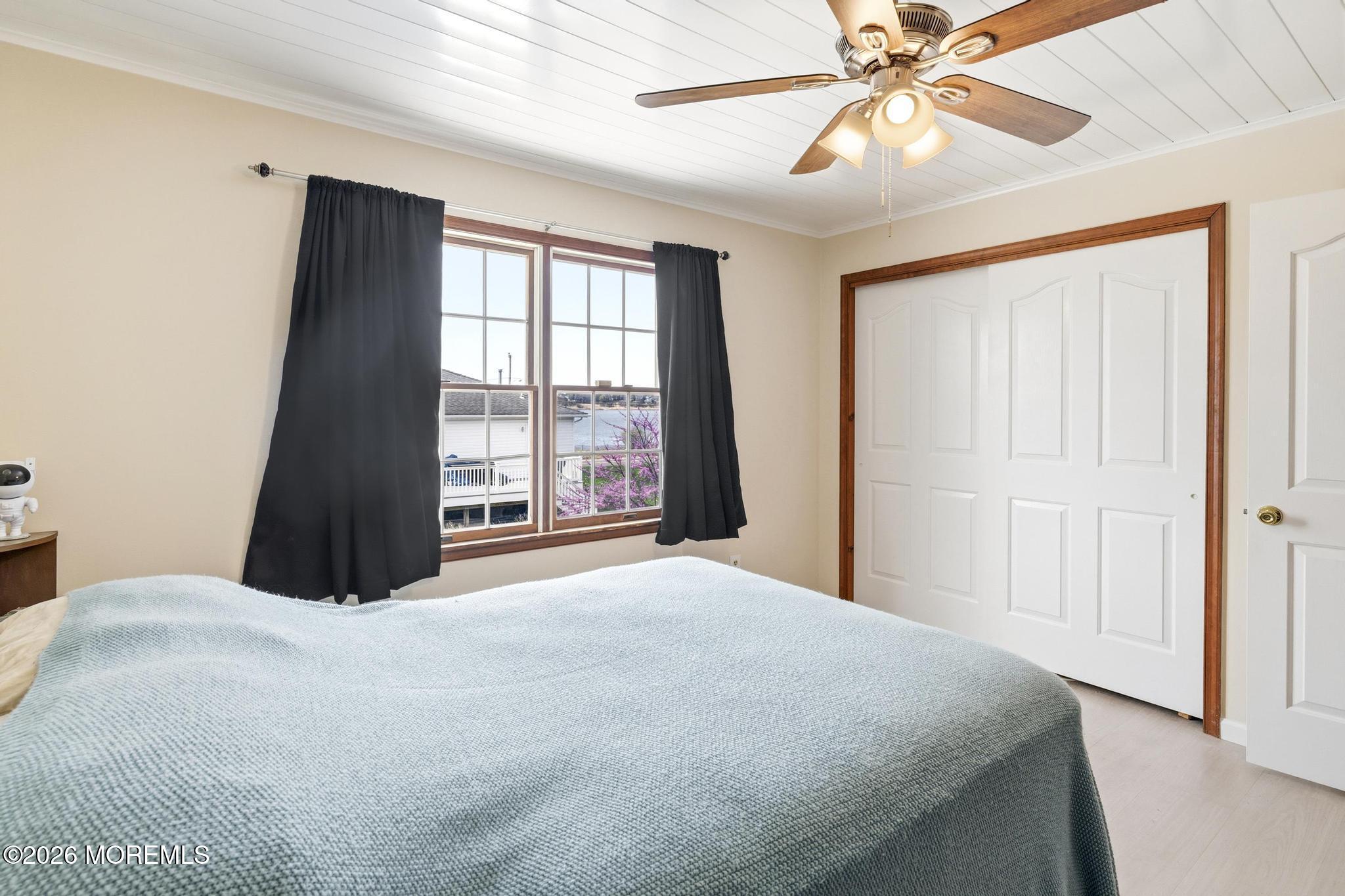 100 Sheldon Avenue Neptune Township, NJ 07753 - Photo 45 of 75 a bedroom with a large bed and a window