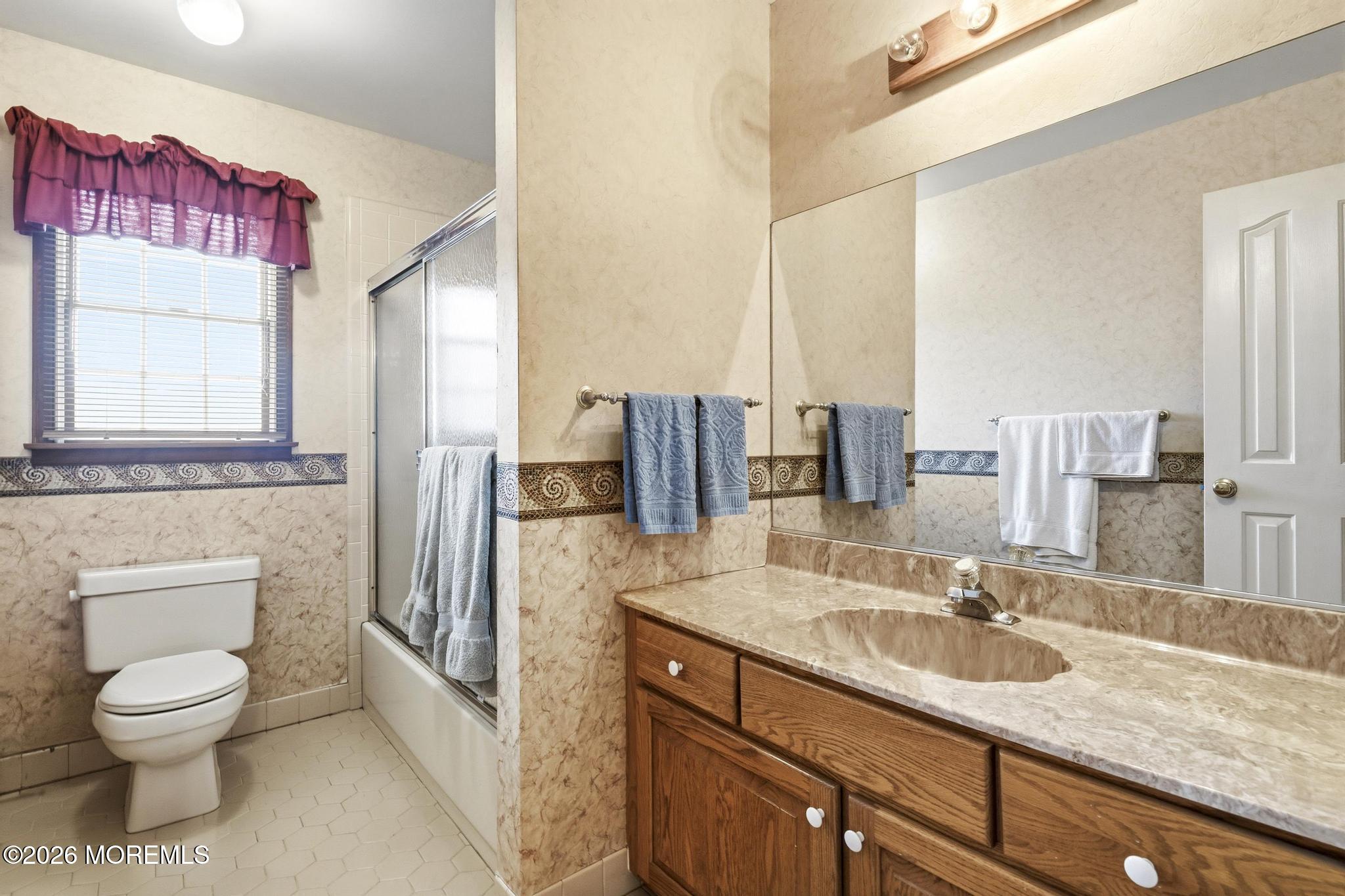 100 Sheldon Avenue Neptune Township, NJ 07753 - Photo 47 of 75 a bathroom with a granite countertop sink toilet and shower