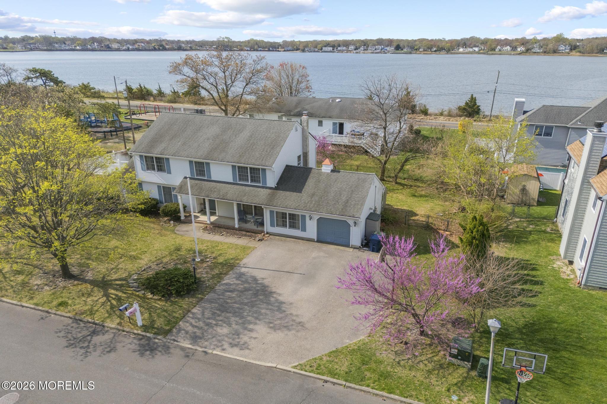100 Sheldon Avenue Neptune Township, NJ 07753 - Photo 54 of 75 an aerial view of a house with a lake view