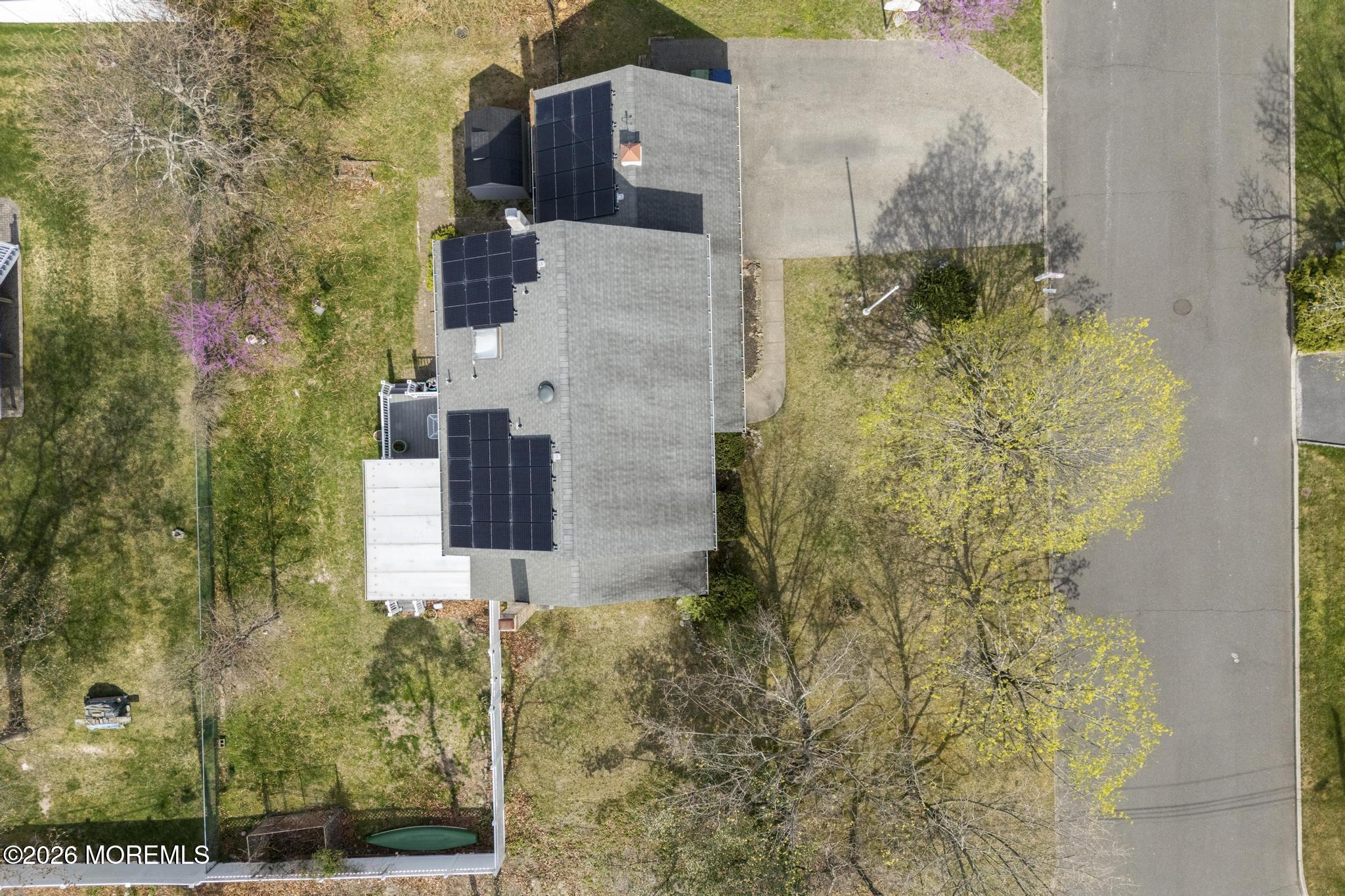 100 Sheldon Avenue Neptune Township, NJ 07753 - Photo 55 of 75 aerial view of a house with a yard and large trees