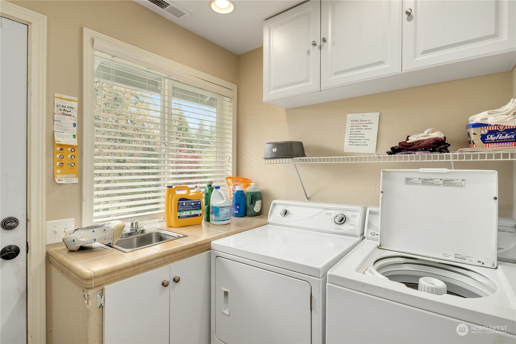 Undisclosed Address Bothell, WA 98021 - Photo 12 of 16 a utility room with dryer and washer