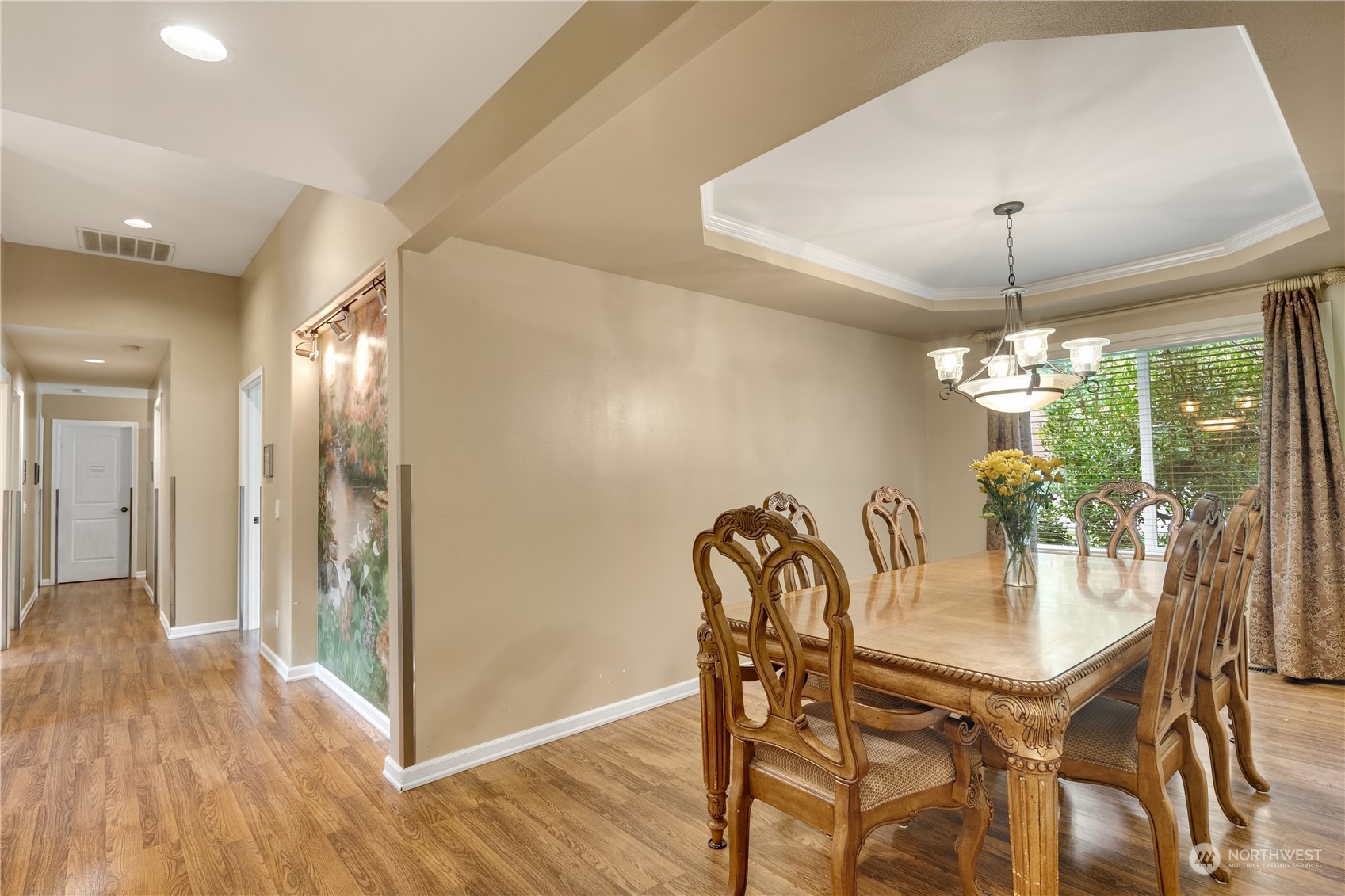 Undisclosed Address Bothell, WA 98021 - Photo 14 of 16 a view of a dining room with furniture window and wooden floor