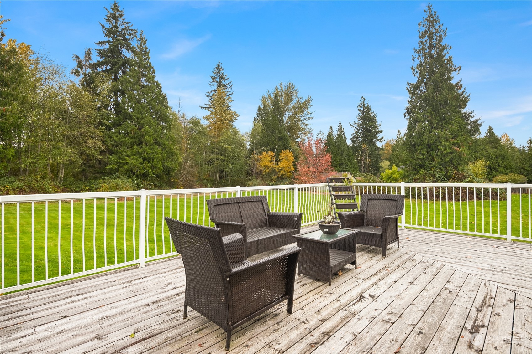 Undisclosed Address Bothell, WA 98021 - Photo 15 of 16 a view of a chair and table on the wooden deck