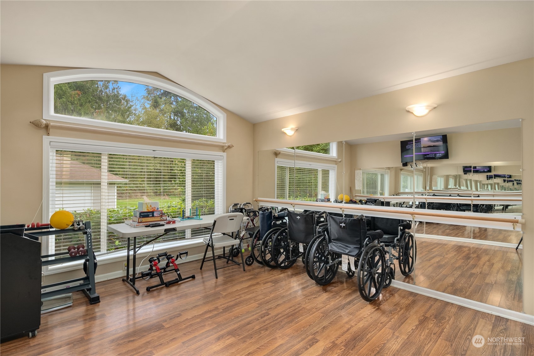 Undisclosed Address Bothell, WA 98021 - Photo 8 of 16 a living room with furniture and wooden floor