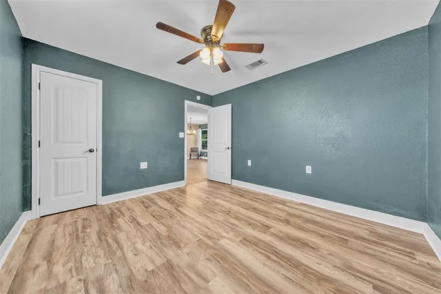 a view of a livingroom with a ceiling fan