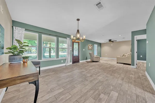 a view of an empty room and window