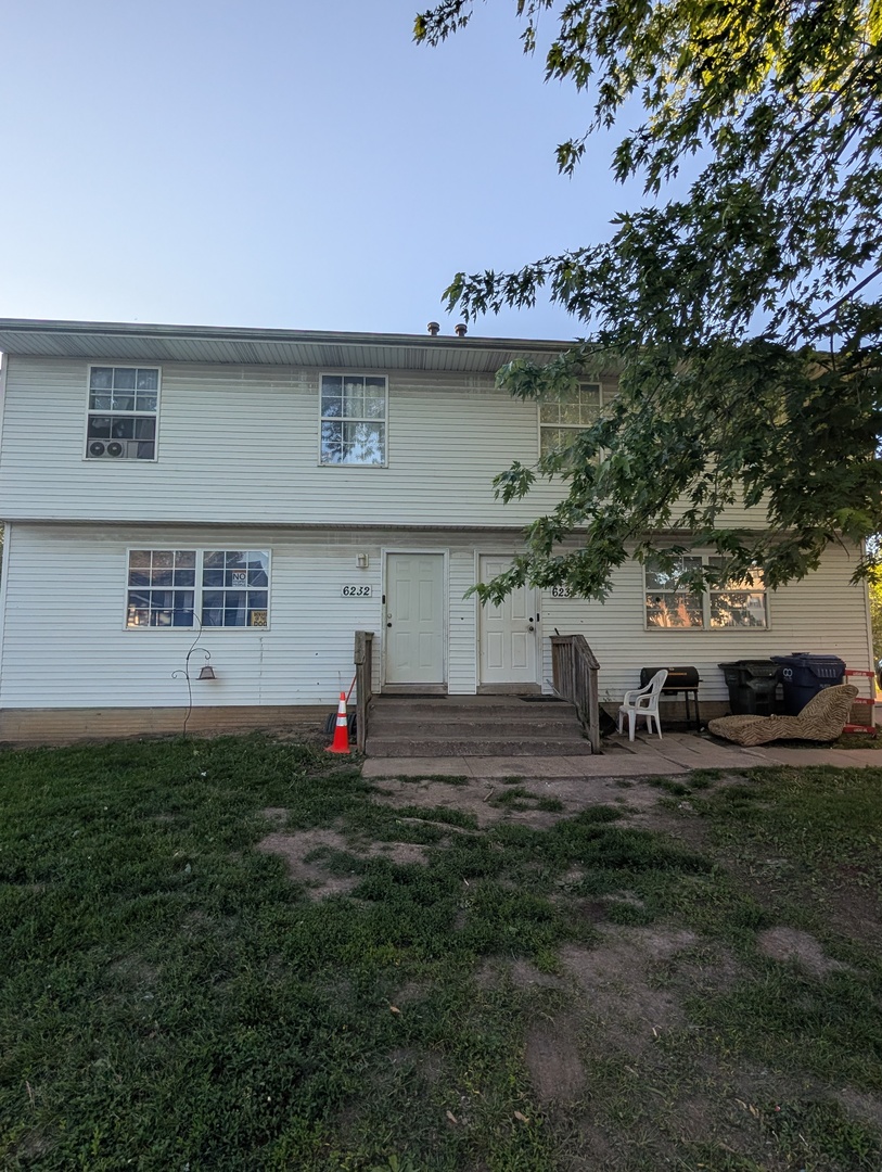 6232-6234 Appomattox Road Davenport, IA 52806 - Photo 1 of 21 a view of street with yard