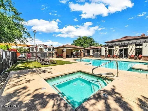 a view of a house with swimming pool