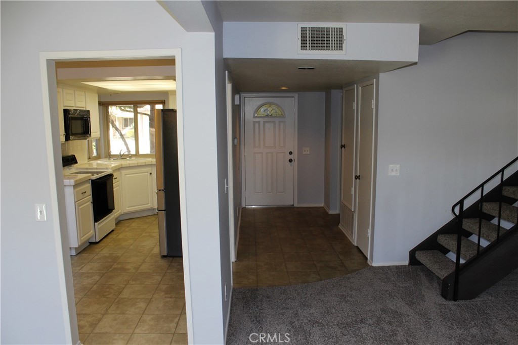 132 Oak Forest Circle Glendora, CA 91741 - Photo 22 of 44 a view of a hallway to rooms and stairs