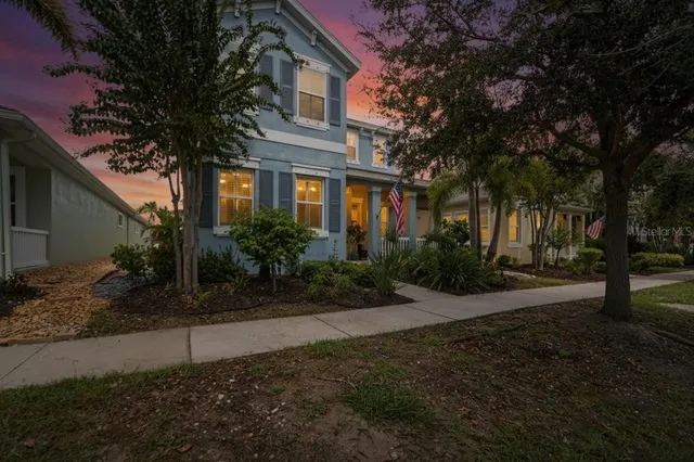 a potted plant in front of a house