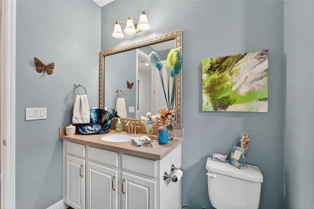 an aerial view of multiple houses with yard