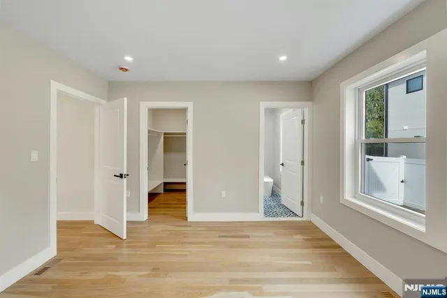 a view of livingroom with wooden floor and window
