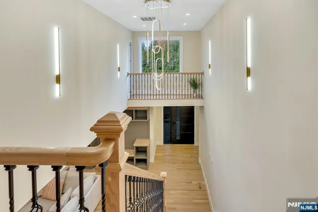 a view of entryway with wooden floor