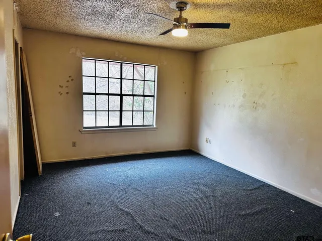 an empty room with windows