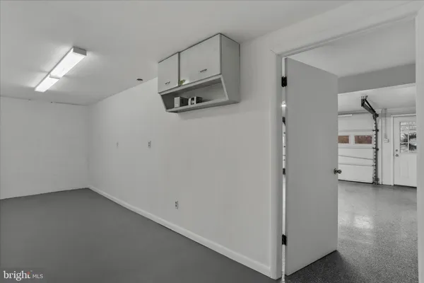 a view of a storage & utility room with closet