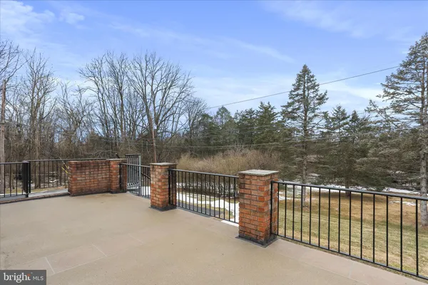 a view of a balcony with lake view