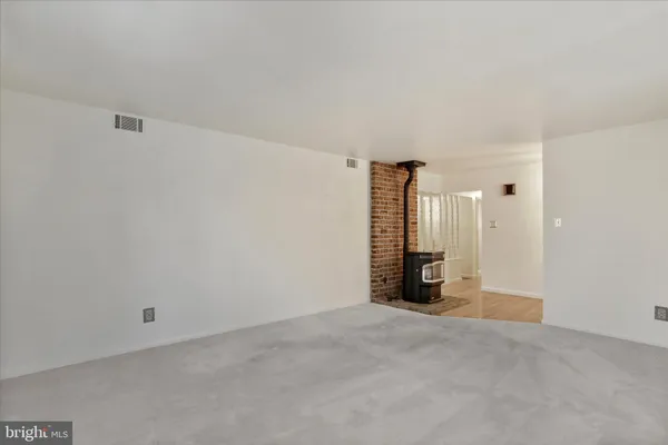 a view of a room with floor to ceiling window