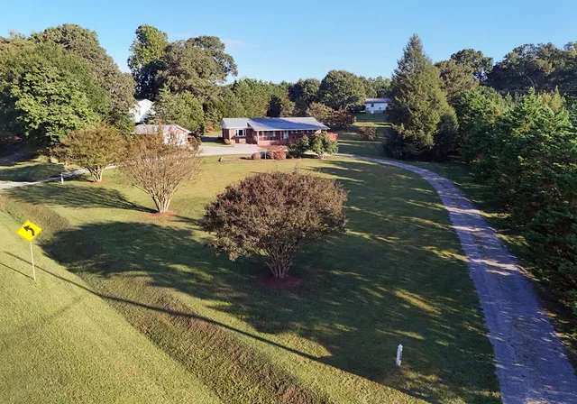 a view of residential houses with outdoor space