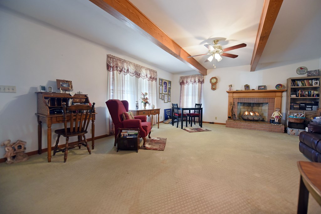 201 Coffey Road Chatsworth, GA 30705 - Photo 30 of 46 a living room with furniture and a fireplace