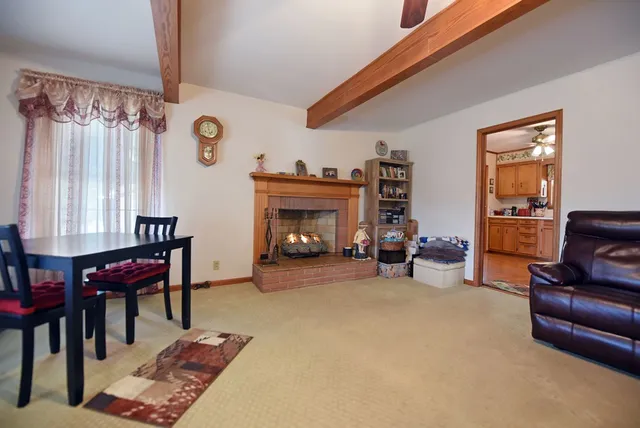 a view of a livingroom with furniture and a couch