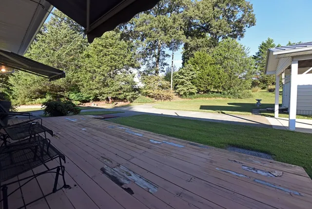 a view of a yard with an outdoor space