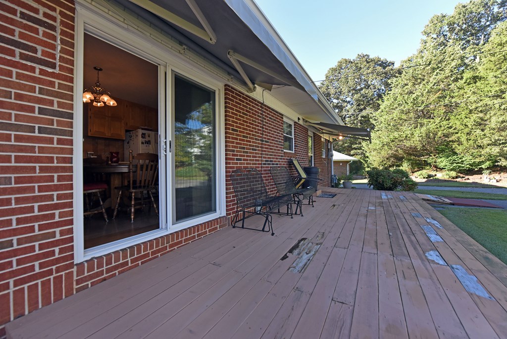 201 Coffey Road Chatsworth, GA 30705 - Photo 37 of 46 a view of a house with backyard and sitting area