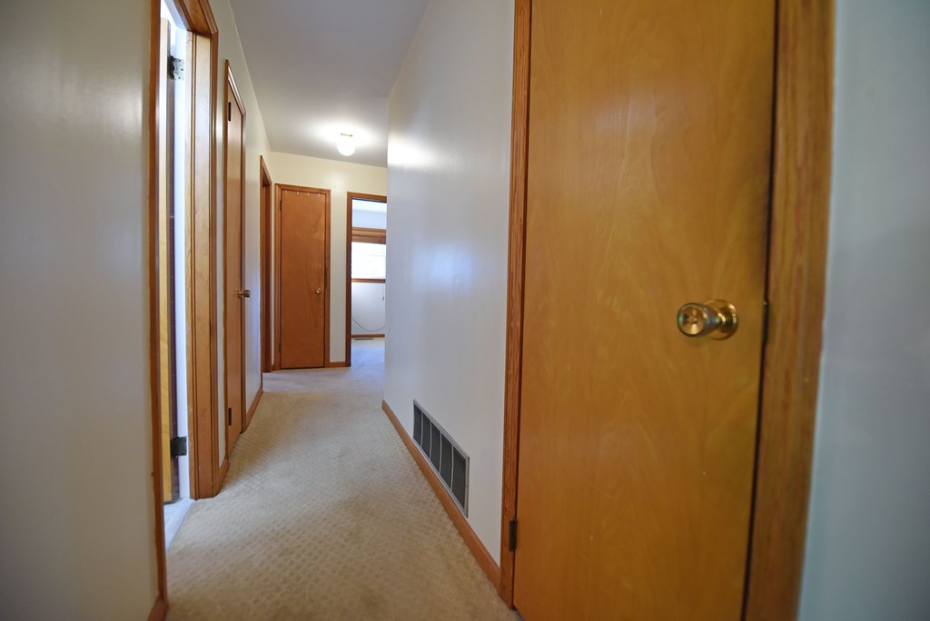 201 Coffey Road Chatsworth, GA 30705 - Photo 45 of 46 a view of a hallway with wooden floor