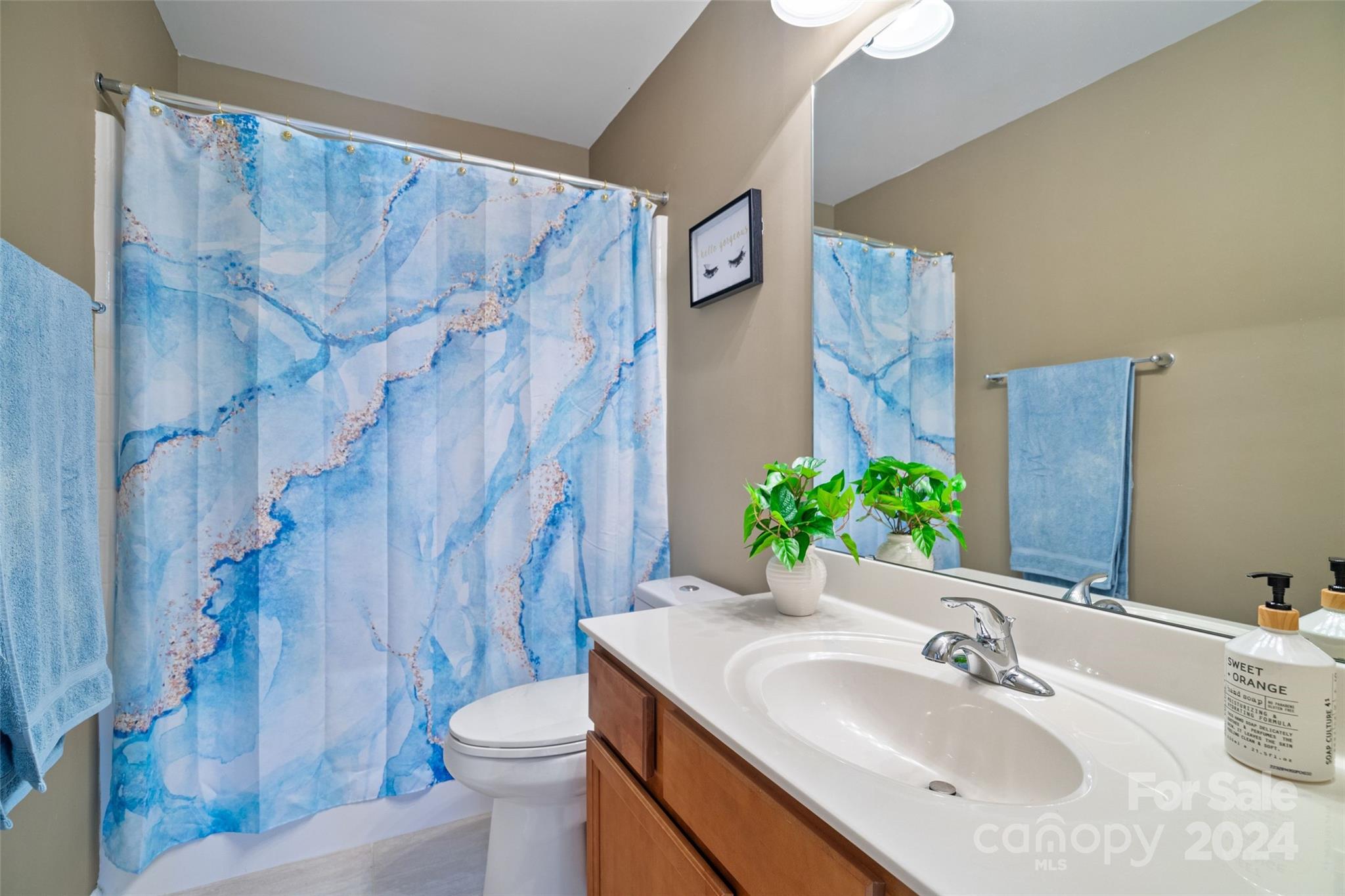 105 Annatto Way Fort Mill, SC 29708 - Photo 15 of 32 a bathroom with a sink vanity mirror and toilet