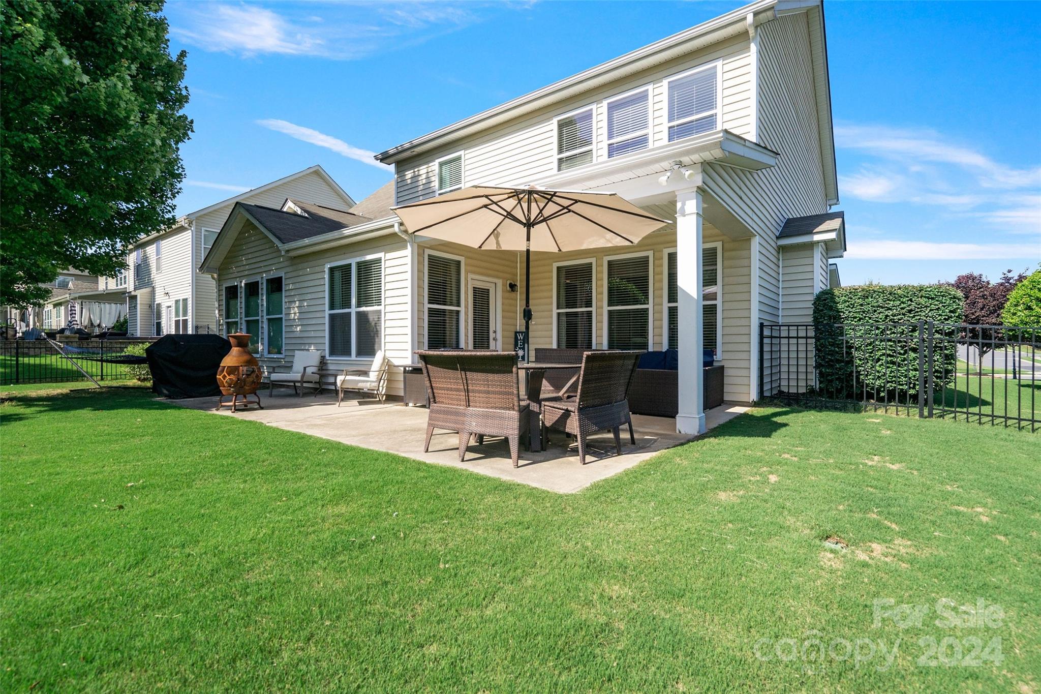 105 Annatto Way Fort Mill, SC 29708 - Photo 19 of 32 a view of a house with a yard porch and sitting area