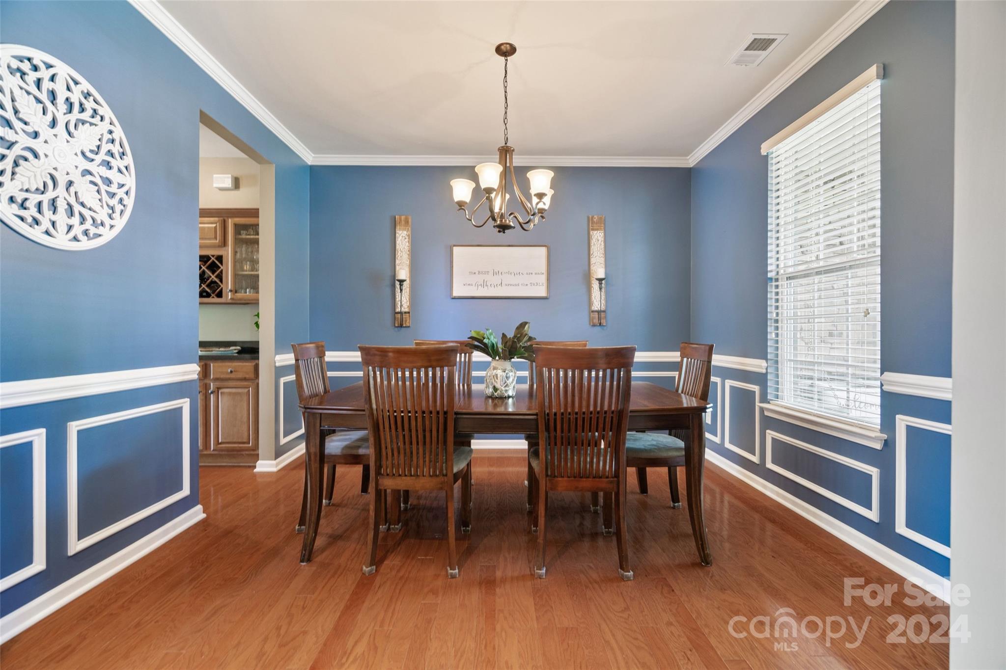 105 Annatto Way Fort Mill, SC 29708 - Photo 6 of 32 a view of a dining room with furniture window and wooden floor