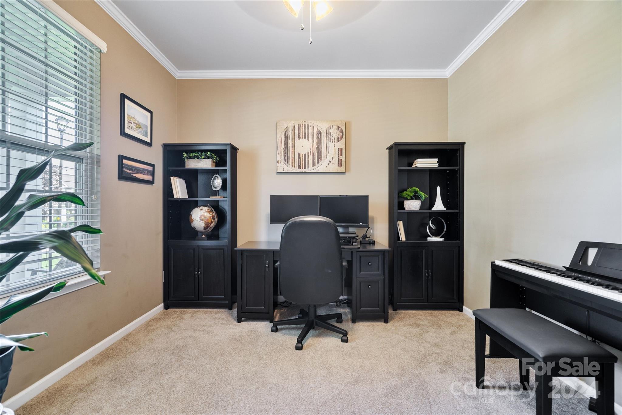 105 Annatto Way Fort Mill, SC 29708 - Photo 7 of 32 a workspace with furniture and a window
