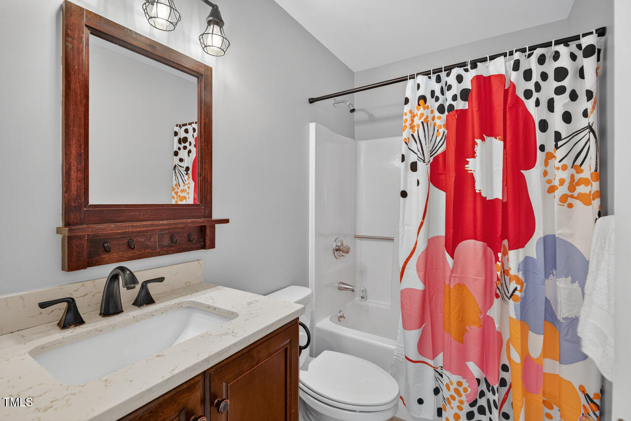 1500 Valley Run Durham, NC 27707 - Photo 15 of 29 a bathroom with a sink toilet and shower
