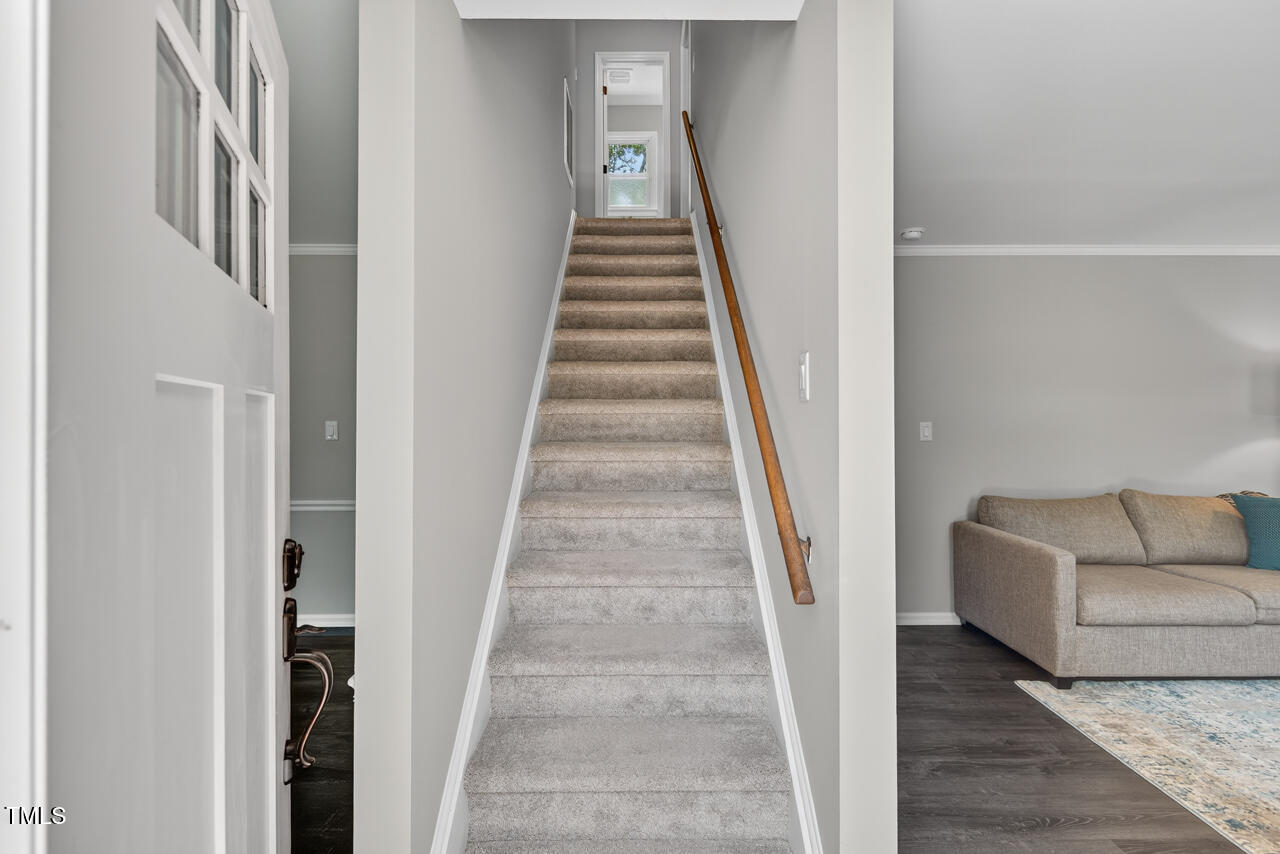 1500 Valley Run Durham, NC 27707 - Photo 17 of 29 a view of entryway and hall with wooden floor