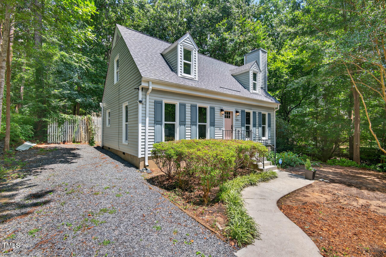 1500 Valley Run Durham, NC 27707 - Photo 26 of 29 a front view of a house with a garden