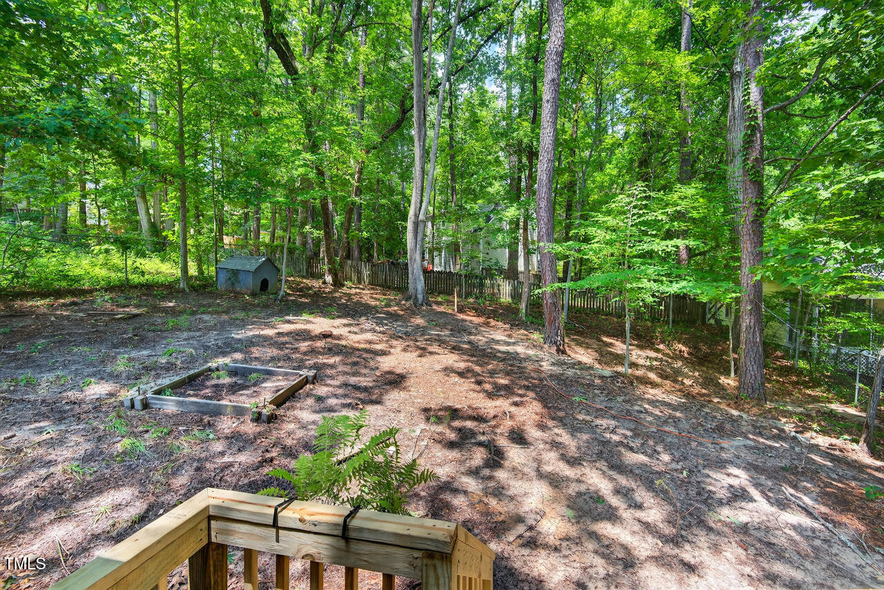 1500 Valley Run Durham, NC 27707 - Photo 28 of 29 a backyard of a house with lots of green space