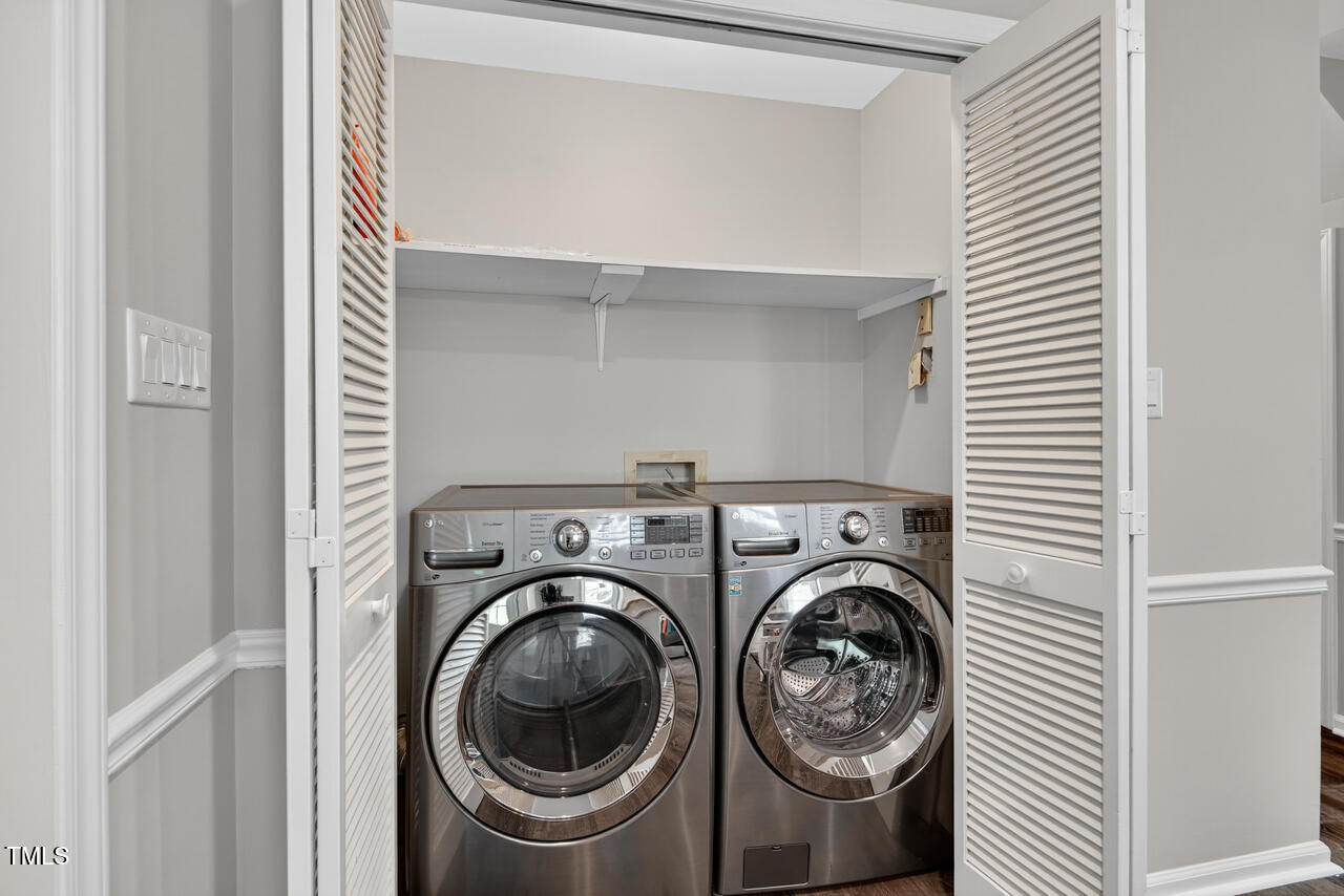 1500 Valley Run Durham, NC 27707 - Photo 9 of 29 a view of storage and utility room with washer and dryer